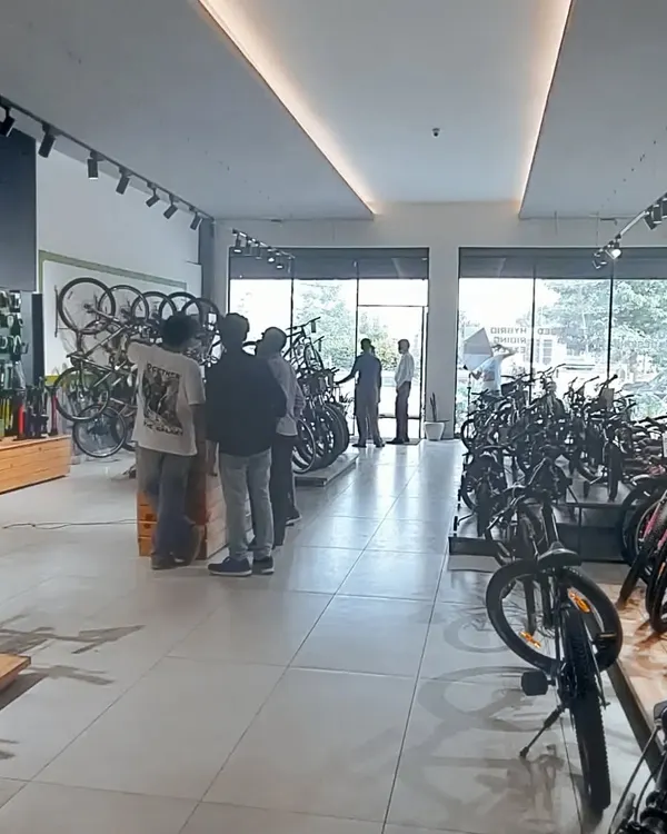 An overall view of a bicycle retail shop I designed. The layout emphasizes open space for easy customer flow, with track lighting to effectively illuminate product displays throughout the store.