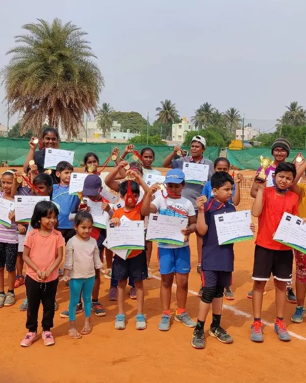 This is what it's all about. A court full of proud young players after our Red and Orange Ball Tournament. We believe in celebrating every player's effort and participation.