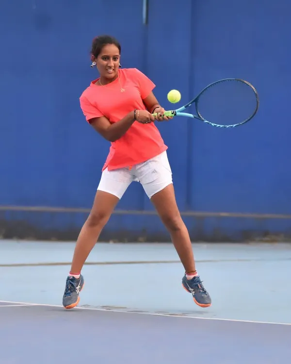 I am a player first, and I bring that energy and experience to every coaching session. This is me in my element, demonstrating the powerful forehand technique and on-court agility that I teach all my students, from beginners to advanced players.