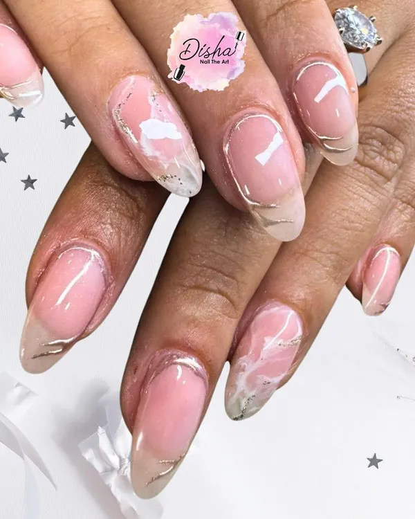 The elegance of white. This design features a milky pink base with abstract white marble and delicate silver line details.