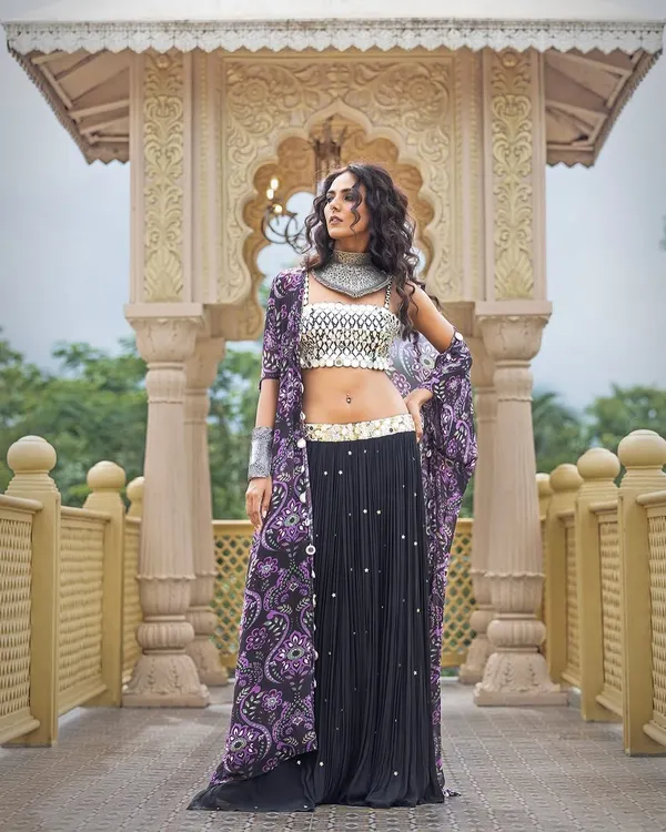 A stunning outdoor shot for designer Sajeda Lehry, using architectural elements to frame the model and her flowing, contemporary ethnic wear.