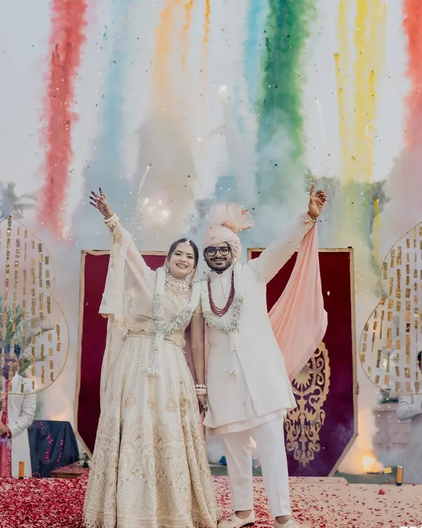 This is what happily ever after looks like. We love creating these spectacular Varmala moments, complete with vibrant smoke effects that make your special day truly cinematic and unforgettable.