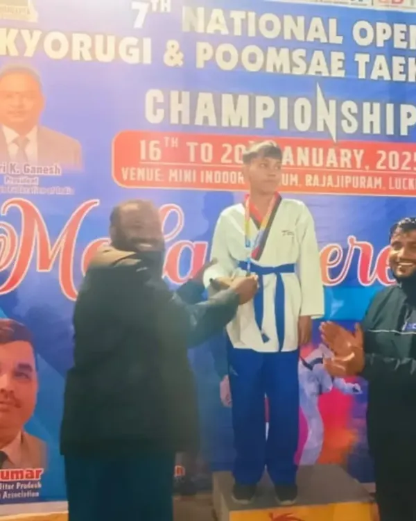 A proud moment at the 7th Open National Taekwondo Championship in Lucknow. My student stands on the podium, receiving his medal after a tough competition.