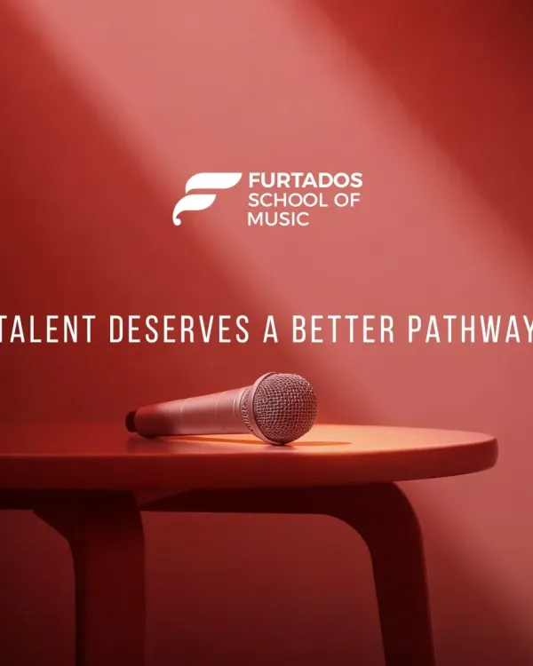 My core belief is that talent deserves a better pathway. This image, with a single microphone on a stool, represents my commitment to creating a structured, safe, and supportive environment where every student's potential can be nurtured.