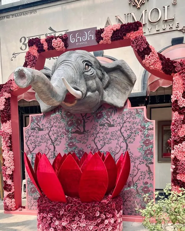 We love creating spectacular entrances that set the tone for an event. For a luxury jeweler's event, we designed this magnificent installation featuring a sculpted elephant head emerging from a wall of pink florals and a velvet lotus.