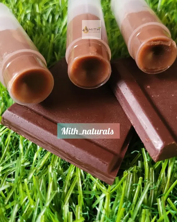 My Homemade Chocolate Lipbalm, ready to go. Made with the creamy goodness of Cocoa Butter and Vitamin E, this balm gives you long-lasting hydration and nourishment for soft, supple lips.