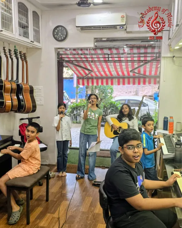Welcome to The Academy of Music, where we learn, grow, and perform together. This is our student band rehearsing for a community event, a perfect example of the collaborative and joyful environment we foster for musicians of all ages.