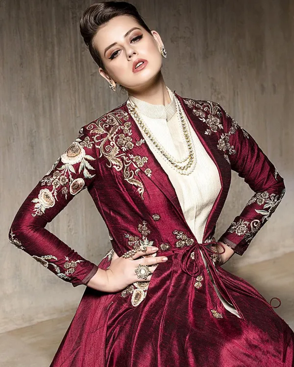 This powerful pose perfectly complements the modern, structured design of the embroidered maroon jacket. It's a great example of how I shoot fusion wear to feel both traditional and contemporary.