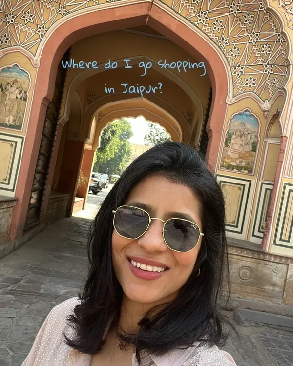 People always ask me where to shop in Jaipur, so I've put together a guide. Here I am at one of the city's iconic gates, ready to explore the best stores for fashion and home decor.