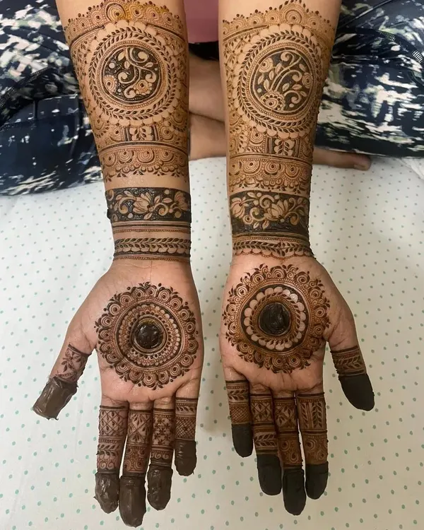 This is the kind of full bridal mehendi I love to create. This design for the lovely bride Anushiya features intricate mandalas on the palms and detailed patterns extending up the arm, all drawn with my smooth, organic henna paste for crisp, clean lines.