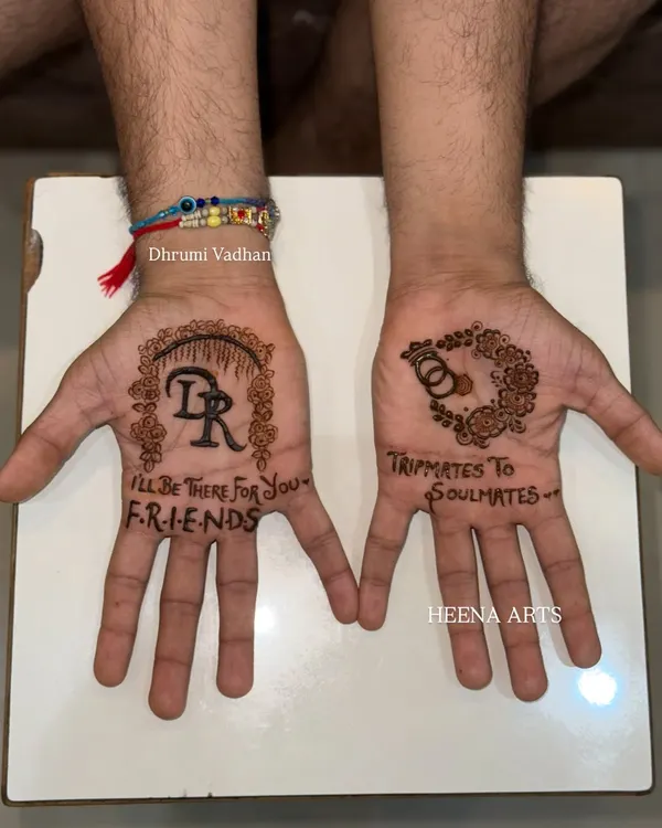 For the groom who is a big F.R.I.E.N.D.S fan! We incorporated the iconic quote "I'll be there for you" along with their initials. The other palm tells their story, "Tripmates to Soulmates," with interlocking rings. This is personalized groom henna at its best.