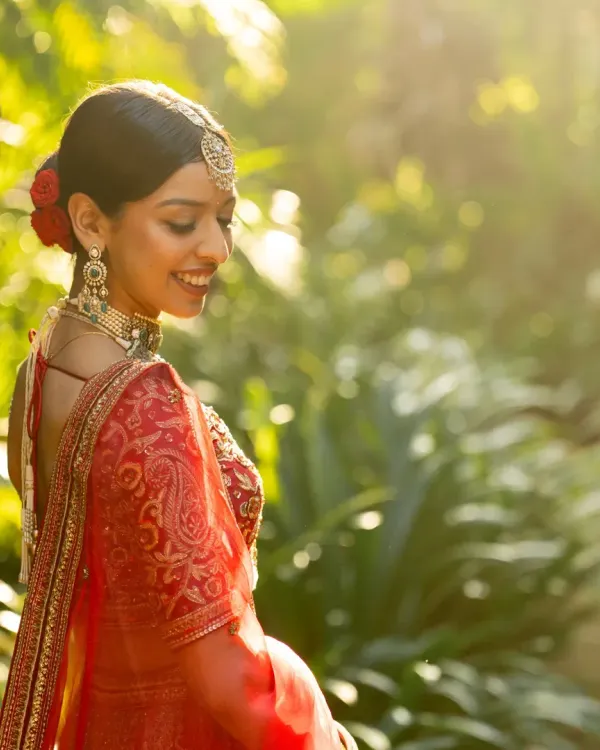 A beautiful, sun-kissed portrait of the bride. I work with photographers to capture these serene moments amidst the wedding hustle.