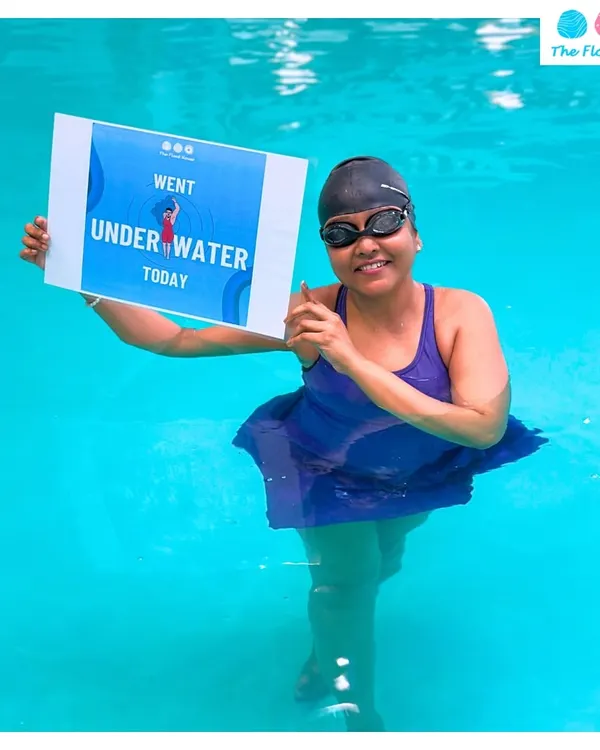 An adult swimmer proudly celebrating her progress. Our Diwali Swimming Camp is open to all ages, helping everyone build confidence in the water.