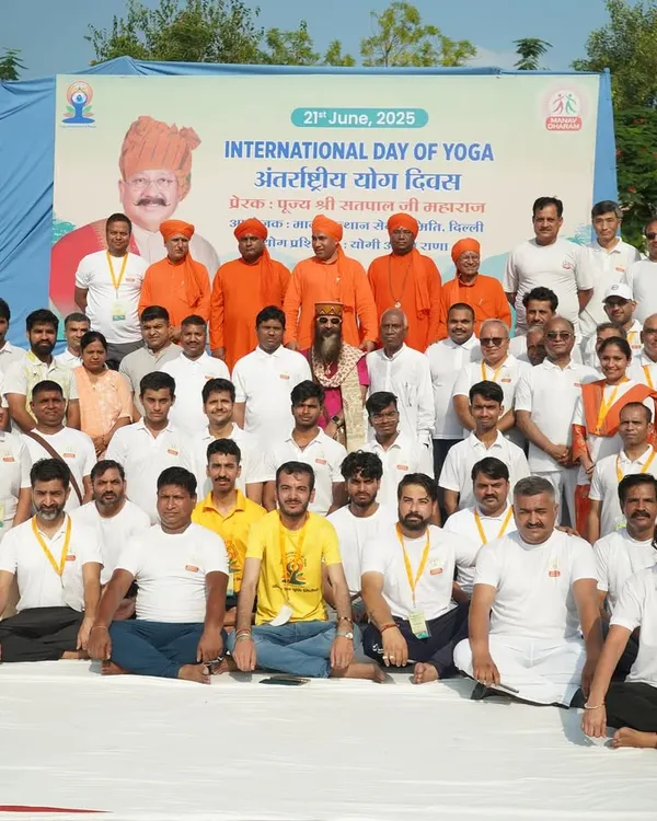 A group photo with participants and organizers at an International Day of Yoga event. It takes a community to create such successful events, and I am thankful for everyone's support.