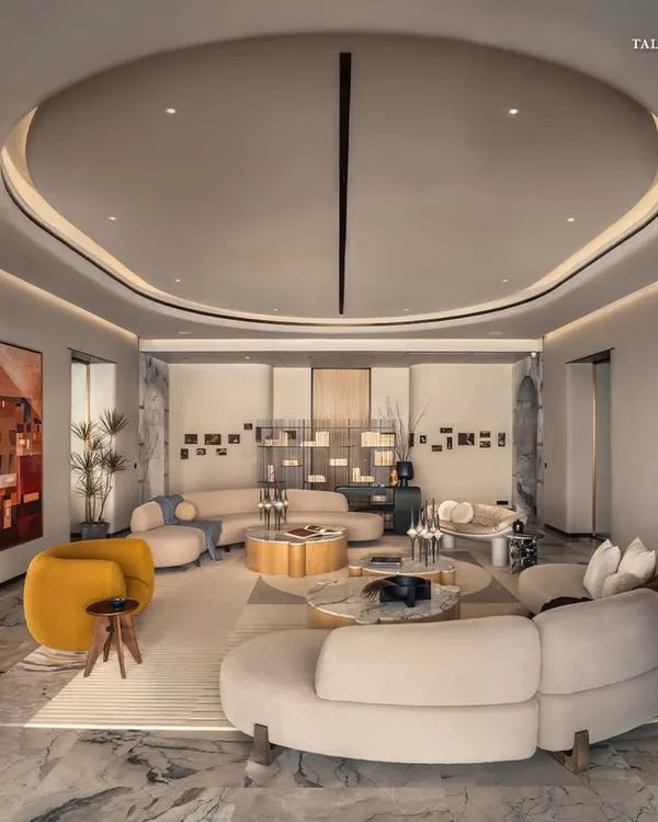 Where architecture meets atmosphere, this living room at our flagship Palais Royale project is designed to exhale serenity. The space is defined not by grandeur, but by grace, with lime wash-textured walls and tempest white marble floors that reflect light softly, allowing the sea view to take center stage.