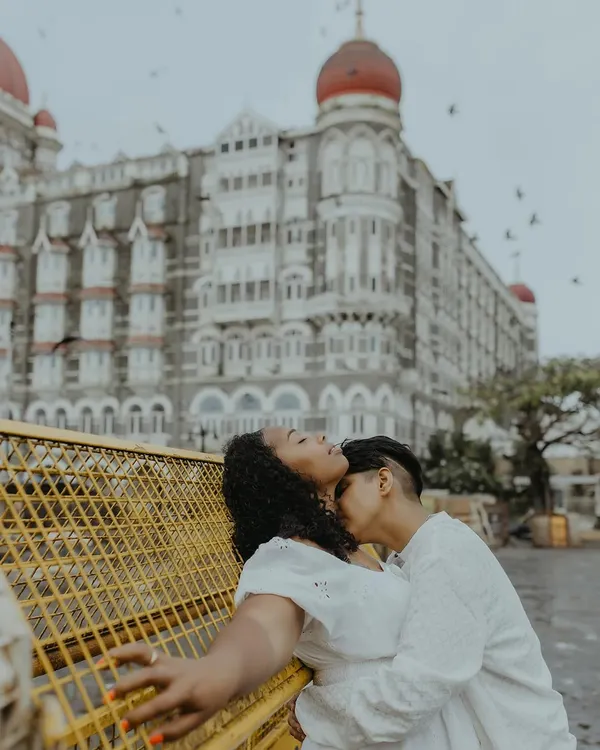 An intimate moment for a beautiful couple in front of the iconic Taj Mahal Palace Hotel in Mumbai. I believe love is love, and I'm passionate about capturing its authentic expression for everyone.
