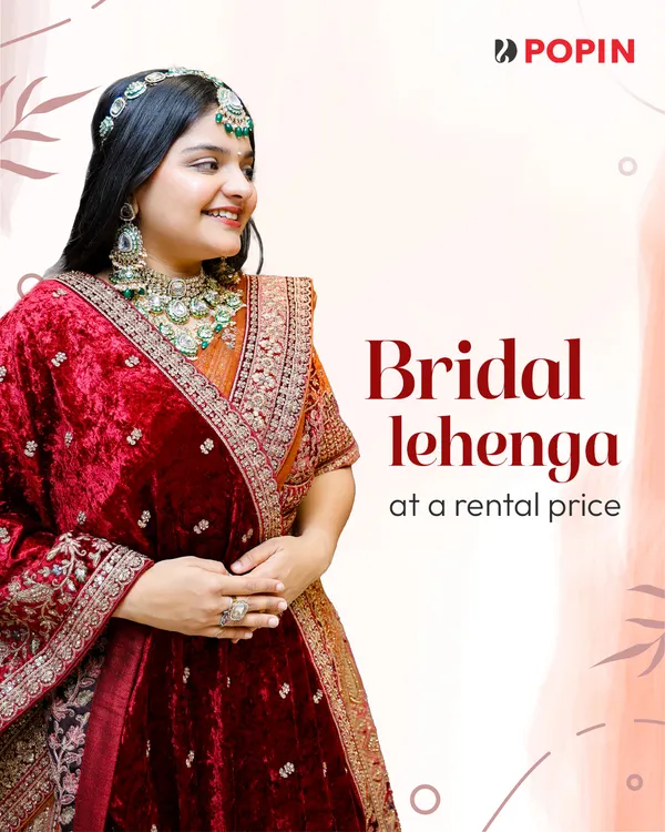 Your perfect bridal lehenga doesn't have to cost a fortune. This rich velvet maroon piece with detailed embroidery is available at a rental price, giving you a royal look for your special day.