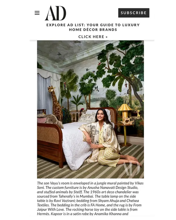A screenshot from the Architectural Digest feature on the nursery I designed. The article highlights the custom furniture and beautiful jungle mural that define the space.