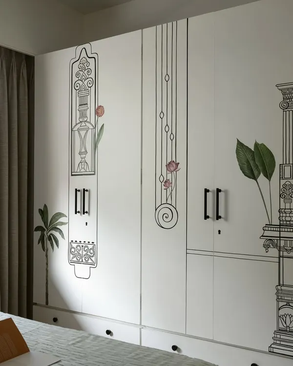 For our Kolam Pop project, we designed these wardrobes with custom illustrations that abstract traditional South Indian architectural elements. The line art turns a simple white wardrobe into a canvas for storytelling.