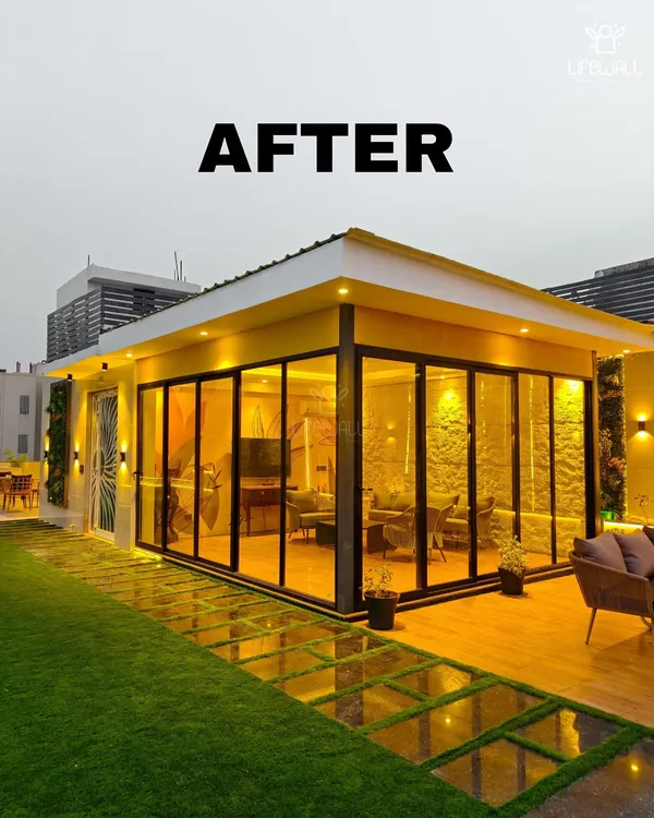 This is what a rooftop room should look like. A full-fledged living space with floor-to-ceiling glass walls, offering panoramic views and a seamless connection to the outdoor garden.