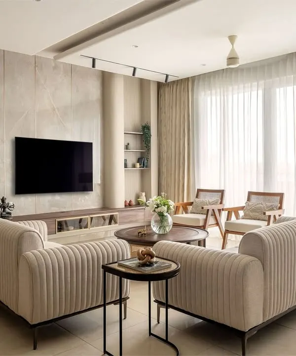 This living room from the Muted Muse series is a story told in textures. I layered cane, natural wood, soft linens, and stone to create a tactile, warm, and organic space that invites you to connect with your surroundings.