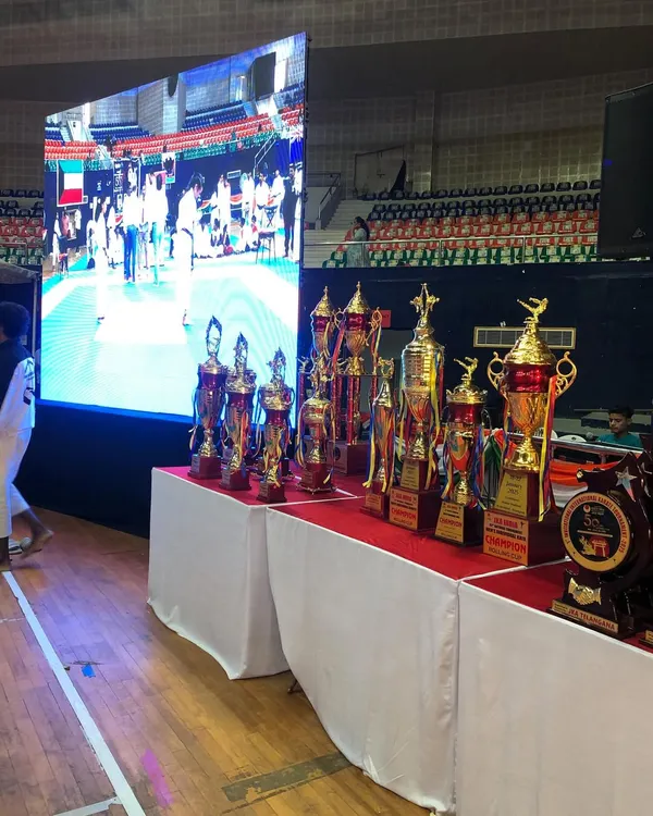A display of trophies from a JKA tournament. These awards represent the culmination of countless hours of dedicated training and the competitive spirit of our karateka.
