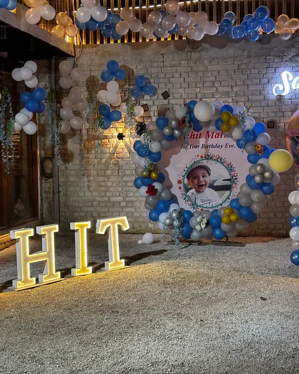 We recently hosted Nihit's first birthday party. I arranged for custom marquee letters and a balloon arch to make his big day extra special.