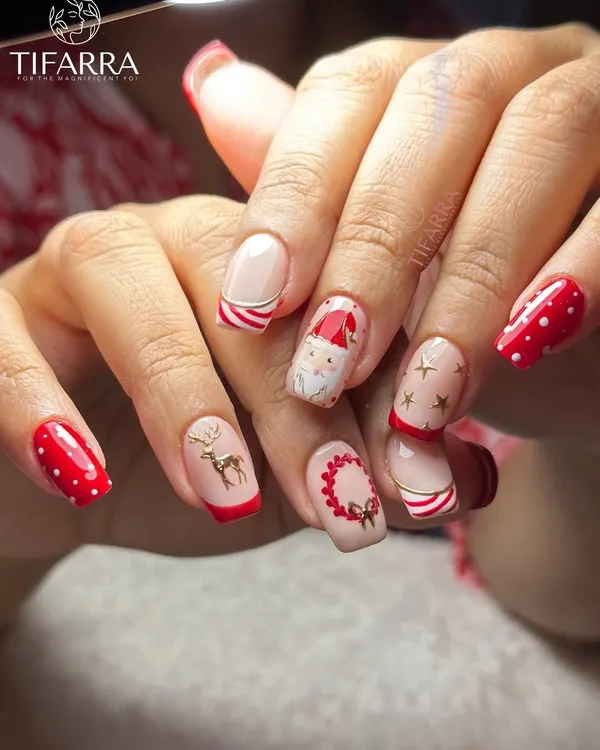 Christmas magic, nail edition. A playful and intricate set featuring hand-painted Santa, reindeer, candy cane stripes, and polka dots.