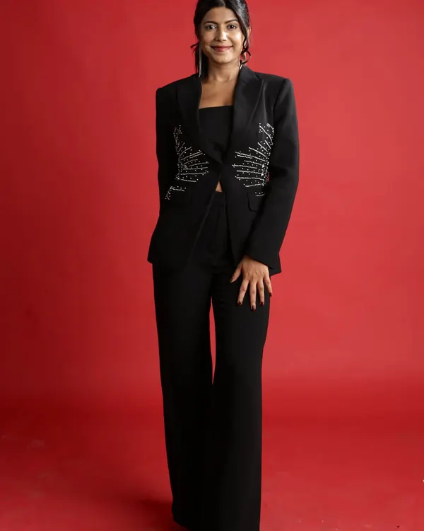 A few of my favorite shots from a professional photoshoot. A sharp, embellished blazer is a power look that works perfectly for a modern corporate event.