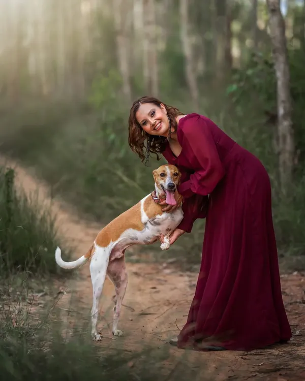 This one is for all the dog mothers out there. This beautiful outdoor portrait captures the loving, gentle connection between a woman and her beloved pet.