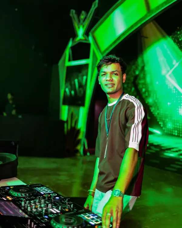 A smile for the camera before I get back to the mix. This is my office, and I love my job.