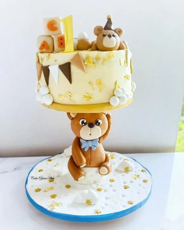 This is my first-ever anti-gravity cake, and it’s a milestone I'm so proud of. I handcrafted this teddy bear design to make a little one's first birthday truly magical. It shows how I love to play with creative ideas to make your celebration's centerpiece unforgettable.