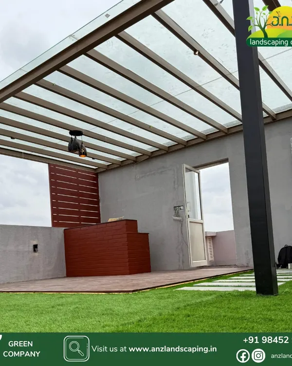 This custom-designed glass pergola at an Assetz Soul & Soil villa provides shade and rain protection without blocking natural light. The structure is made from a powder-coated MS frame with a toughened glass roof, perfect for Bangalore's weather.