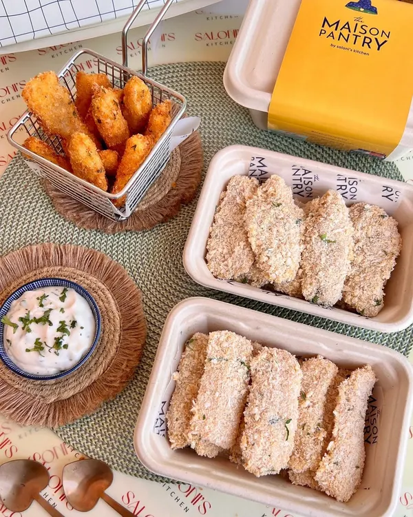My cook-and-serve fish fingers, shown both ready-to-fry and golden-brown after cooking. They come with a delicious tartare dip, making for a quick and easy gourmet snack you can prepare at home.