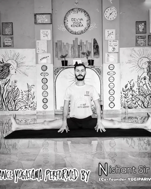 Nishant Sir in Samakonasana, the side split, demonstrating complete control and balance. This pose requires immense dedication and is an inspiration for our students on their own yoga journeys.