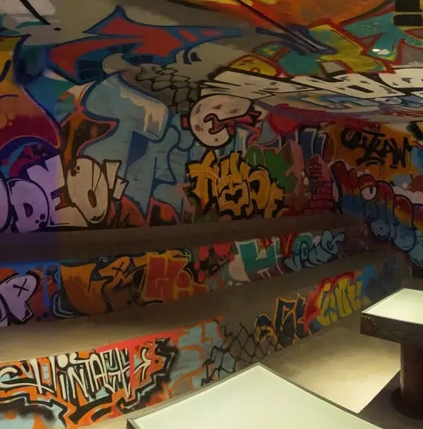 This is what I call Graff Overload. I turn entire spaces into an immersive experience, covering every surface with tags, characters, and color. If you want a room that hits you with pure energy, this is it.