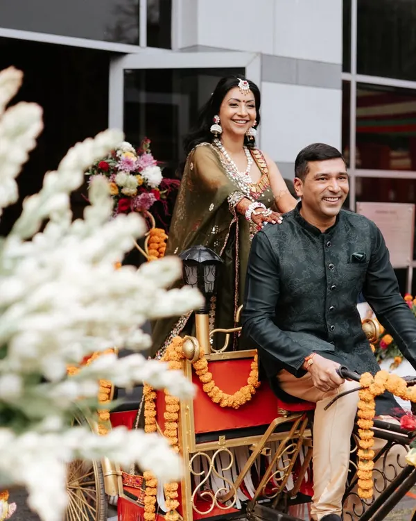 The pure joy on the couple's faces during their fun Mehendi entrance is what it's all about. We love creating these happy memories.
