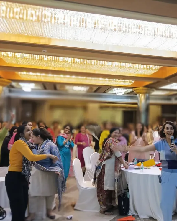 A room full of 150 educators, completely immersed in a moment of play during one of my training sessions. This image captures the energy and connection that happens when teachers are given the space to rediscover their own creativity, which they can then take back to their students.