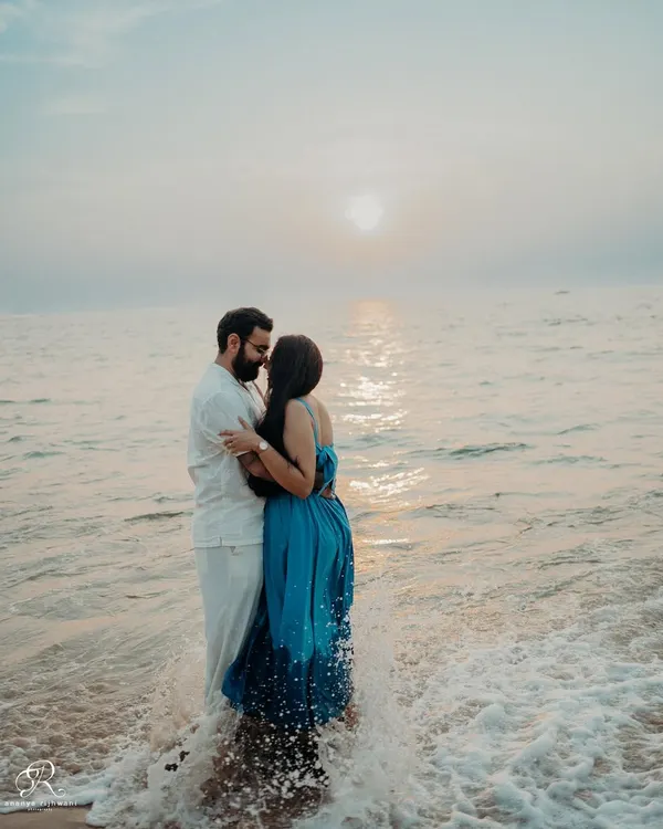 An intimate sunset embrace in the warm Goan sea. I focus on capturing these quiet, romantic moments during a couple shoot, letting the natural light and the connection between two people tell the story.