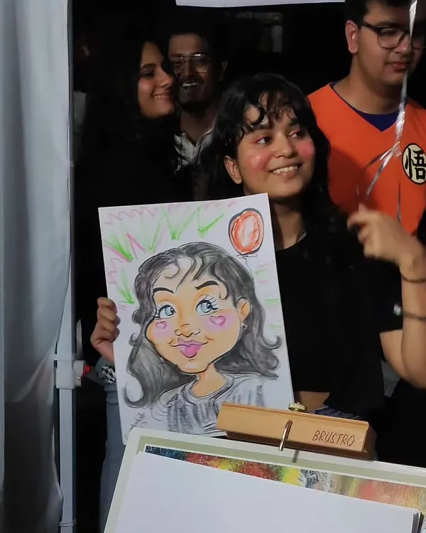 The pure joy on her face says everything. This is why I love being a caricature artist.