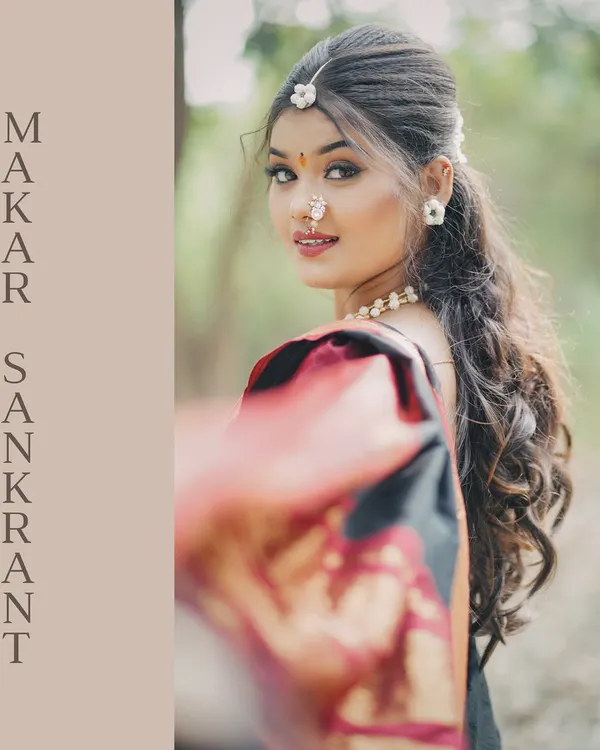 A beautiful Makar Sankranti special portrait of a Marathi Mulgi in a traditional black saree, capturing the festive spirit with a soft, elegant glance.