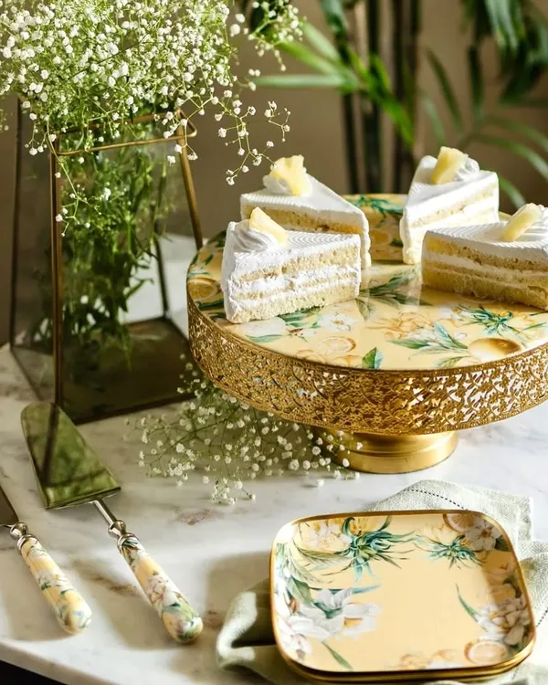 Summer birthdays just got sweeter with our Lisbon Lemon collection. The cake stand, server, and platters feature a sunny, cheerful print, perfect for creating a picture-perfect dessert table.