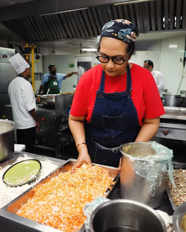 There is nothing better than using bare hands to create. Here I am in the kitchen, mixing ingredients for a thoran. I believe the best food is made with a personal touch, just like it's eaten.
