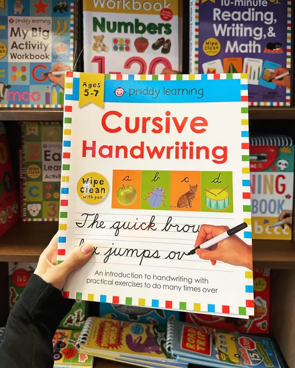 We offer a variety of tools to make learning fun, like this "Cursive Handwriting" workbook. It's a wipe clean book, allowing for practical exercises that can be done many times over to build confidence and skill.