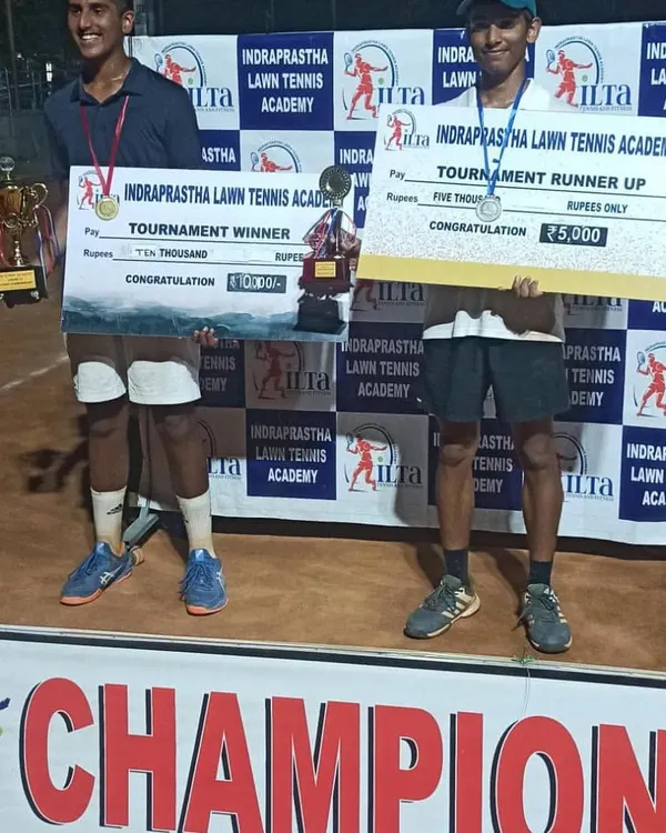 The finals of our prize money tournament showcase top tier talent. Here are the tournament winner and runner up with their cheques for seven thousand and five thousand rupees respectively. This is what high stakes tennis looks like.