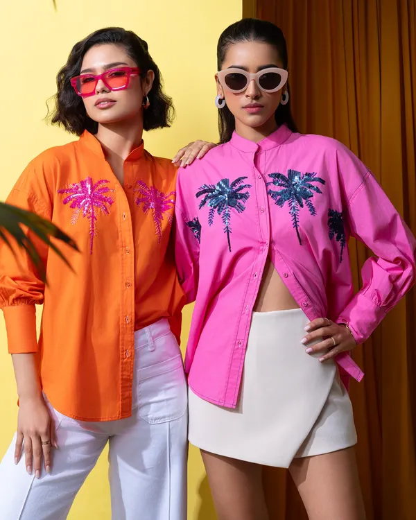 A vibrant shot for Boho-Chic's summer campaign, focusing on bold colors and sequin details. We coordinated the styling and lighting to make the apparel pop against the custom yellow set.