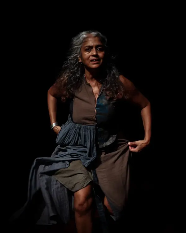 A haunting moment from our solo production of "Medea." The play uses stark visuals and a powerful performance to explore the depths of a woman's despair in the face of exile.