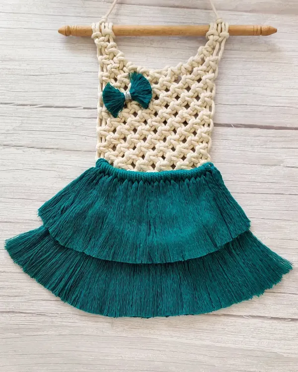 I love getting custom orders for baby room decor. I made this adorable macrame dress wall hanging for a baby girl whose mother loves all things handmade. The teal skirt and little bow are so sweet.
