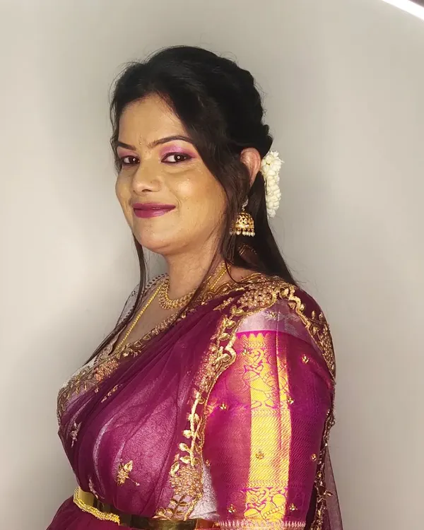 Kalyani looking lovely for her cousin's wedding. I created a soft glam look with pink eyeshadow and a matching lip, paired with a simple hairstyle.