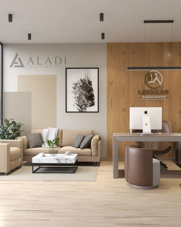 A wide view of a modern office reception and meeting area, designed with natural wood panels, comfortable seating, and prominent company branding to welcome clients.
